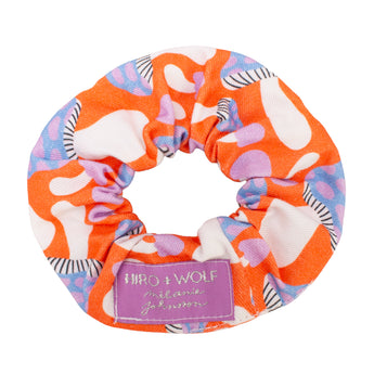 Colorful scrunchie with abstract pattern on a white background